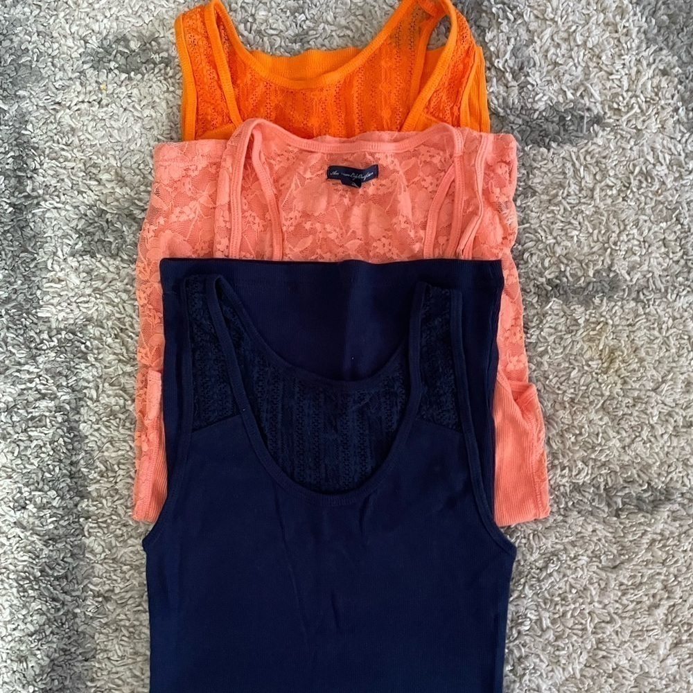 3 tank tops with open backs
